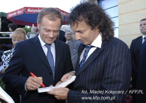 Polish Prime Minister, Donald Tusk, creating a Smile for Marek's Project Smile